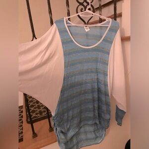 NWOT. Raglan sleeve. Light blouse. Longer in the back. Multiple sizes available